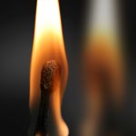 Burning matchstick close-up