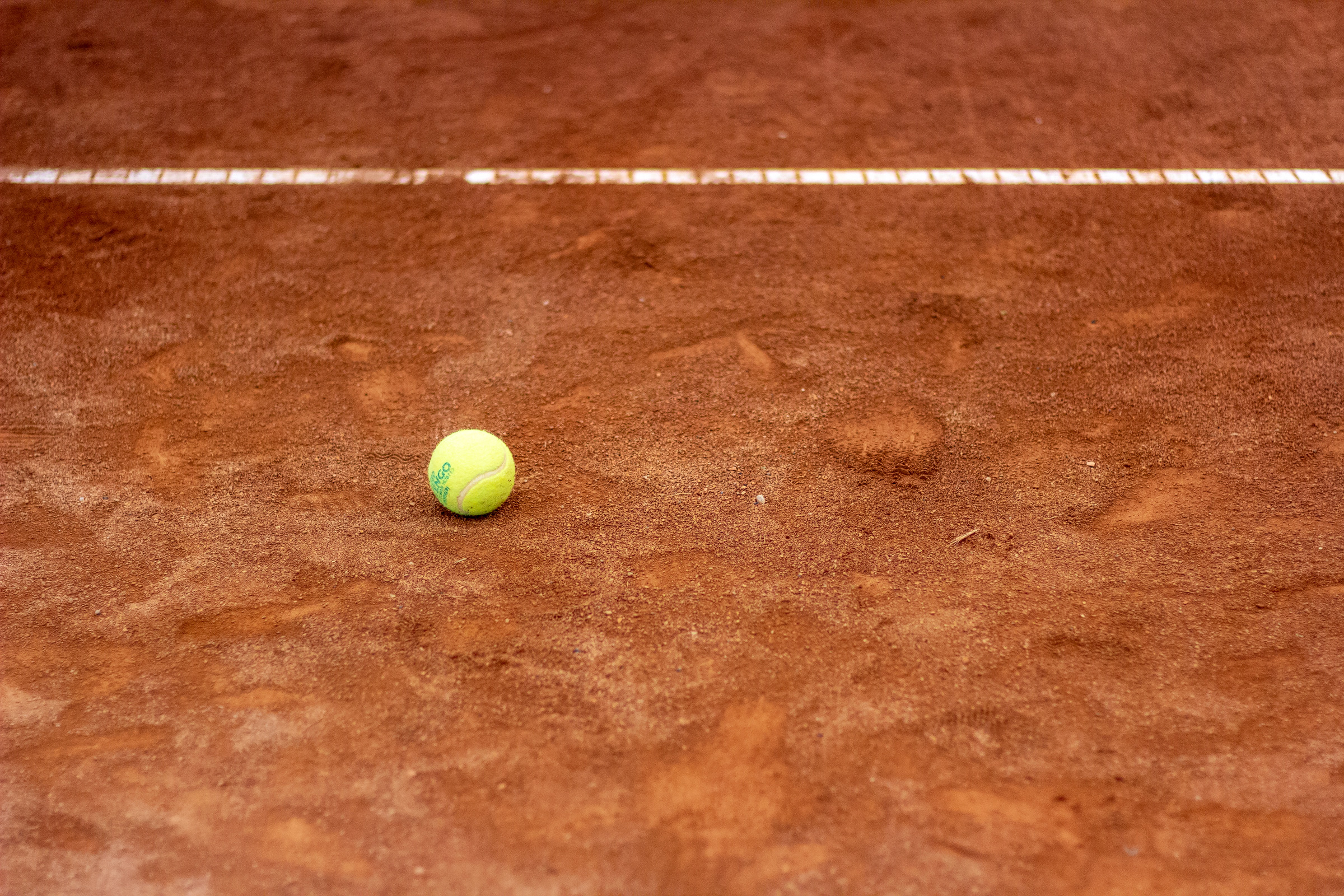 Tennis court with tennis ball