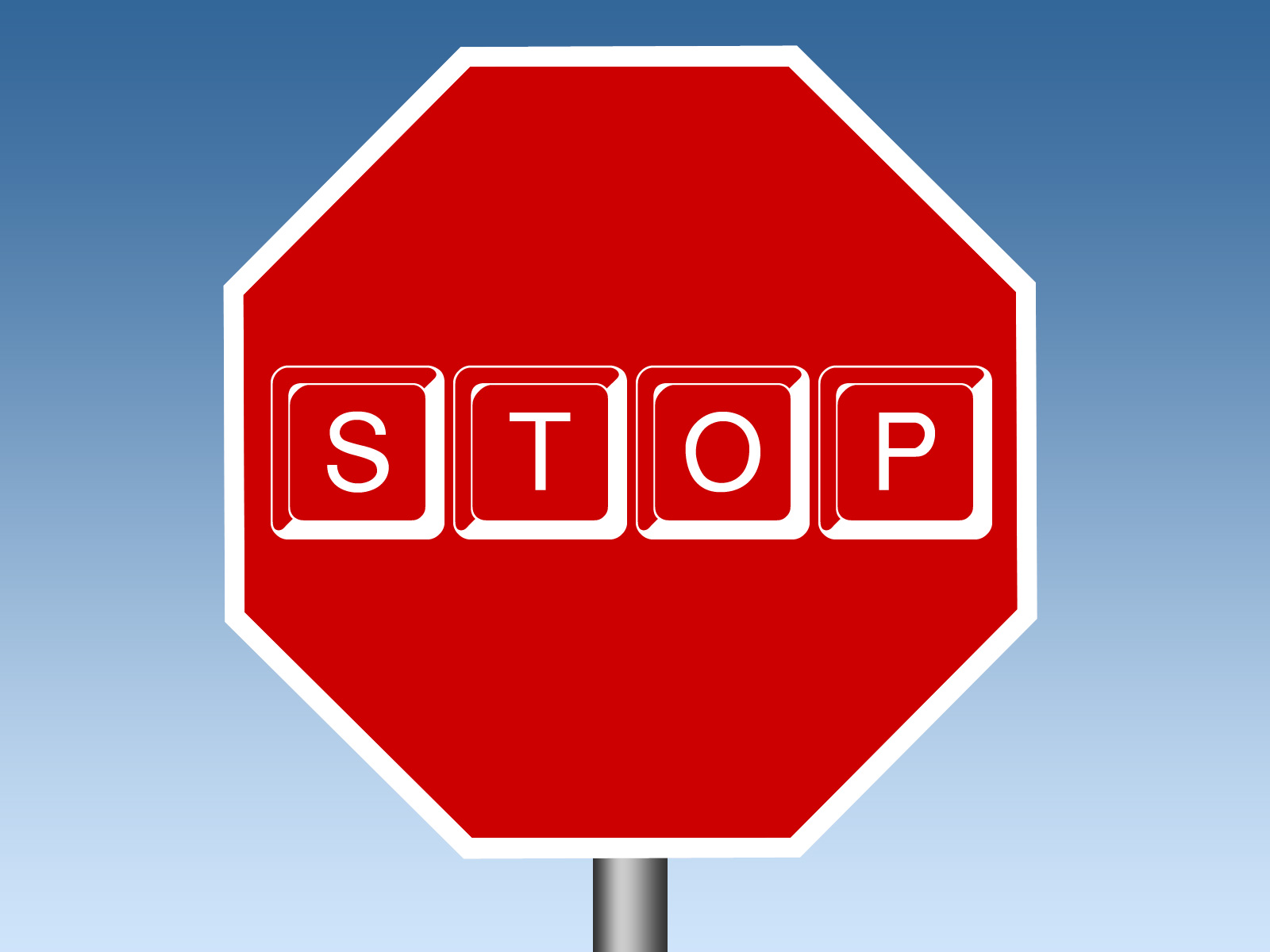 Red stop sign with letter keys