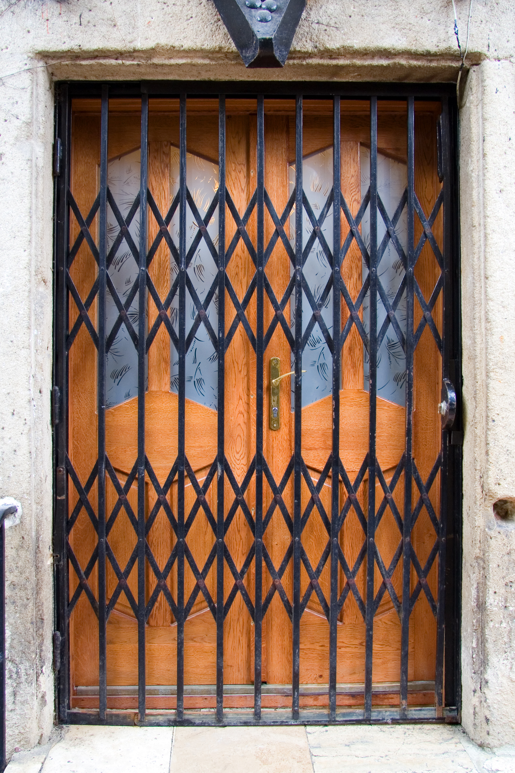 Entrance with metal folding door