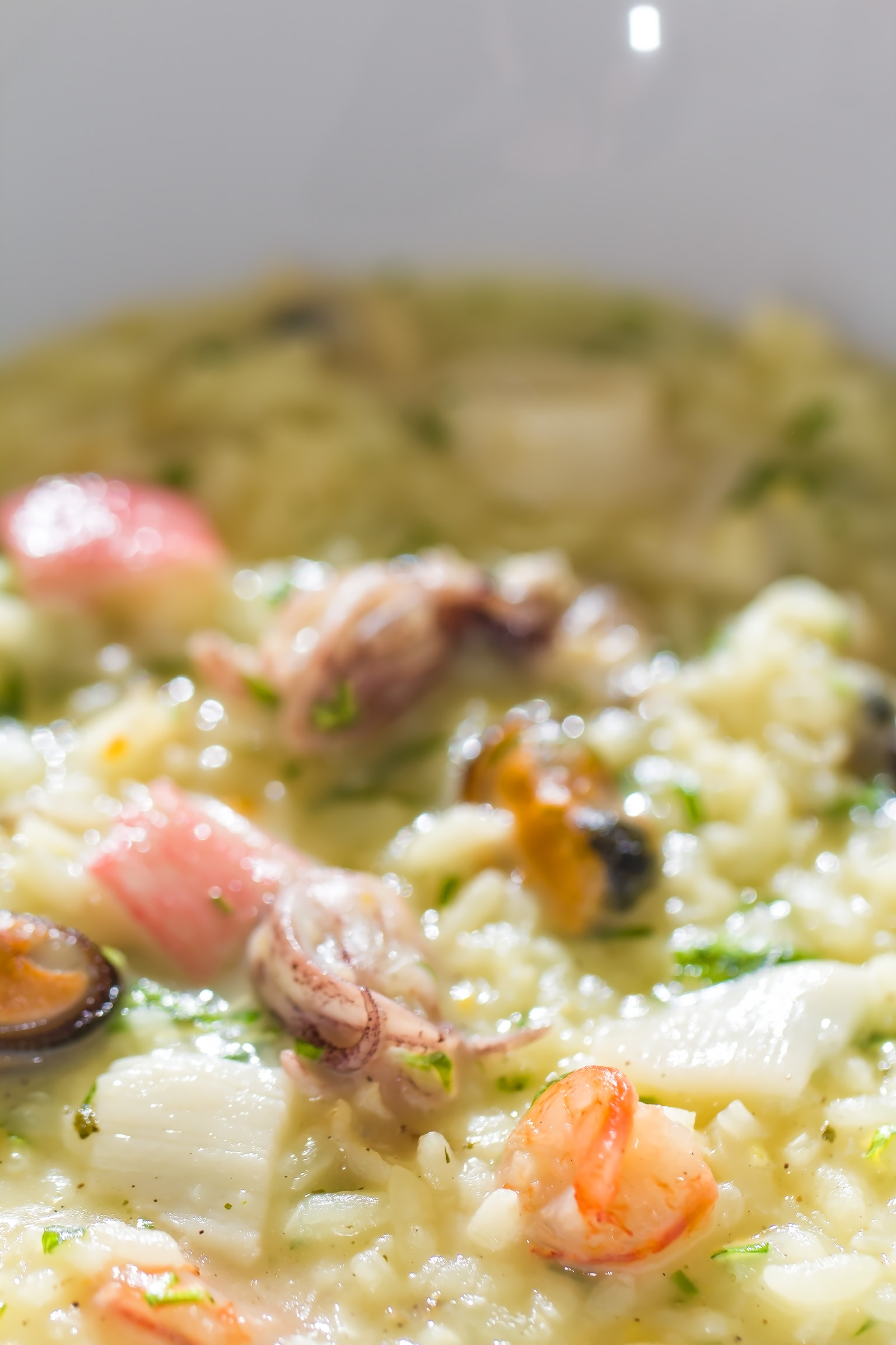 Seafood Risotto with fresh parsley, Parmesan cheese