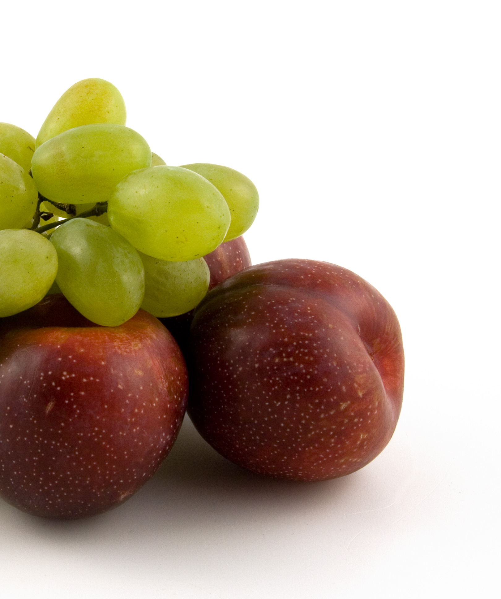 Apples and grapes on whitebackground