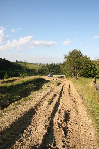 Deep ruts on a dirt road