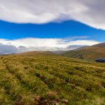 Mountain panoramic landscape with blue sky and clouds