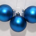 Three blue Christmas globes