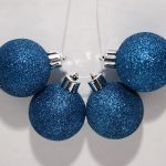 Four blue Christmas balls