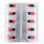 Medicine blister pack of red and black capsule