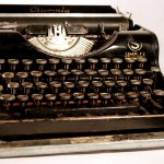 Retro vintage typewriter on white background