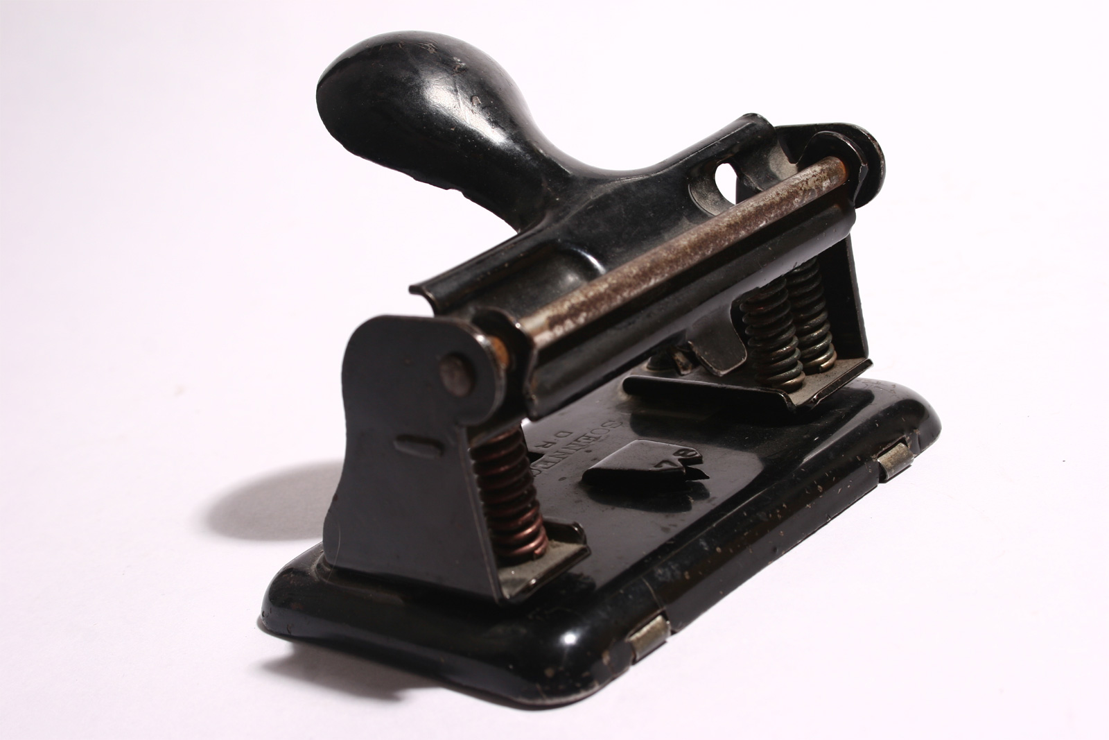 Old metal hole punch