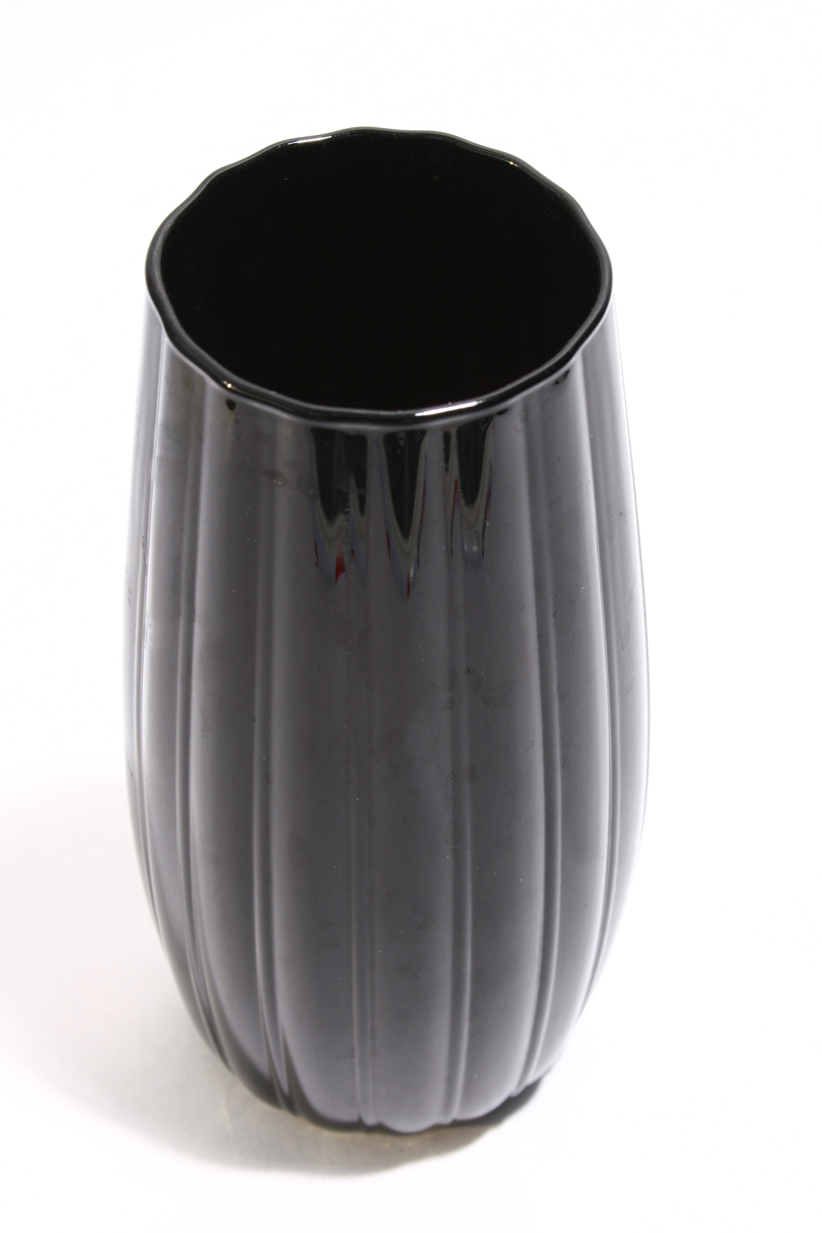 Black vase from above on white background